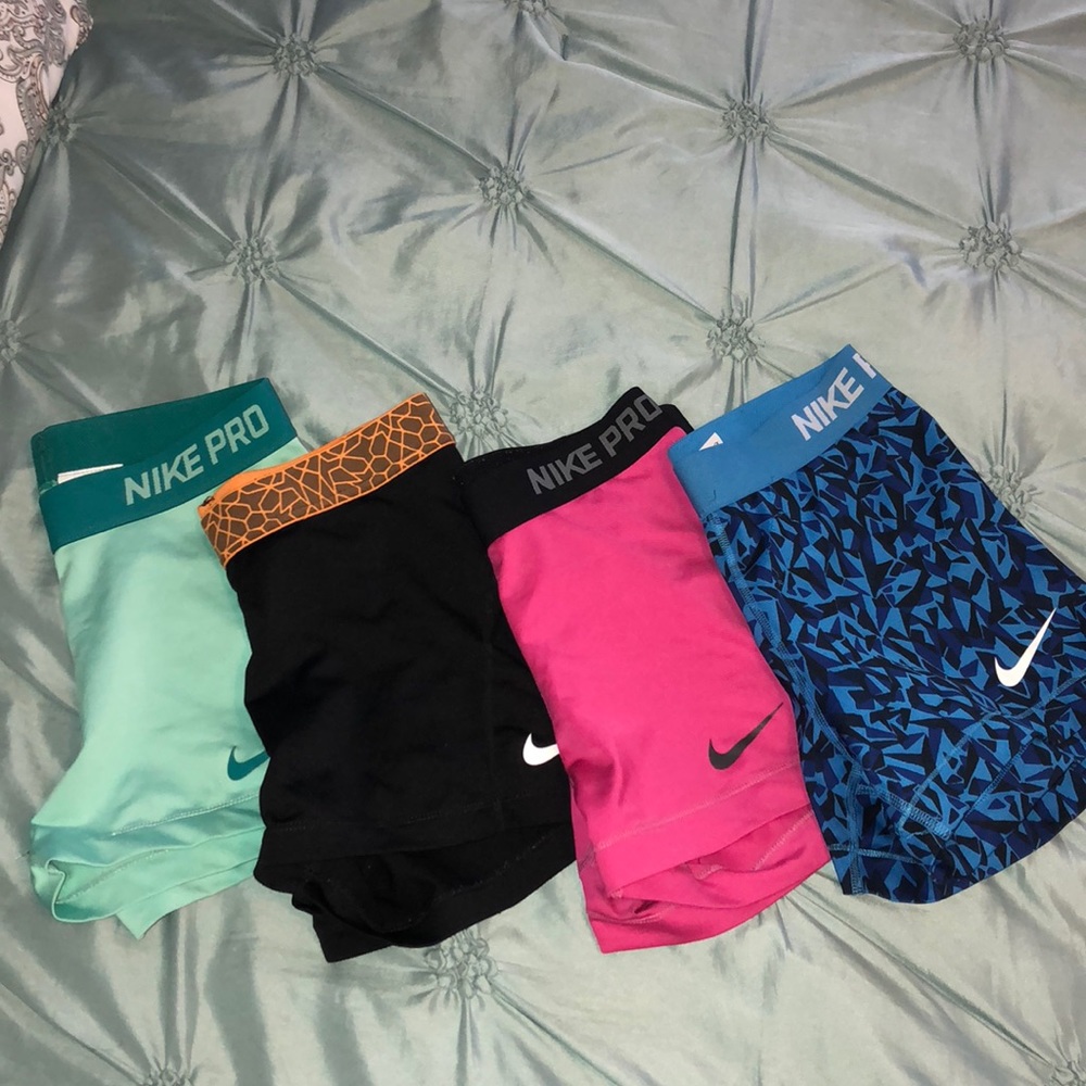 4 Pairs of Medium Nike Pros